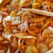 Пържени свински хапки с лук