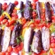 Печени сардини в лозов лист с домати и чушки